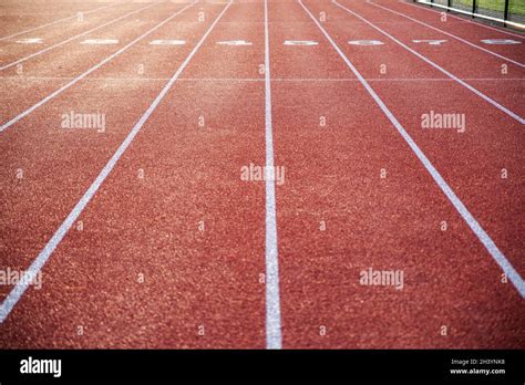Running Track With Numbered Lanes And Crisp Lines Stock Photo Alamy