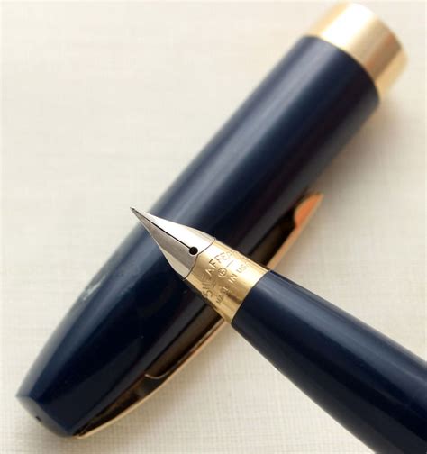 The parts of a fountain pen all work together through capillary action to maintain a constant flow of ink without leakage. 9708 Sheaffer Imperial Touchdown Fountain Pen in Blue ...