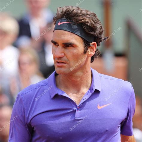 Seventeen Times Grand Slam Champion Roger Federer In Action During His