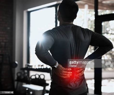 Man Sore Back Photos And Premium High Res Pictures Getty Images