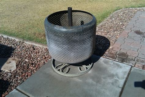 Certain things should never be put in the washing machine. Washing machine tub fire pit... | Barrel fire pit, Cool ...