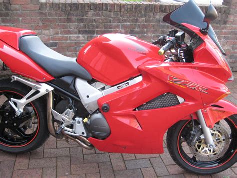 Paid little over 14k ride away in victoria. honda vfr 800 vtec.2004 24k FSH VGC