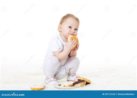 Little Child Eating Doughnuts Stock Photo Image Of Funny Baby 29113130