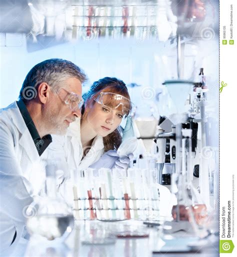 Health Care Researchers Working In Scientific Laboratory Stock Image