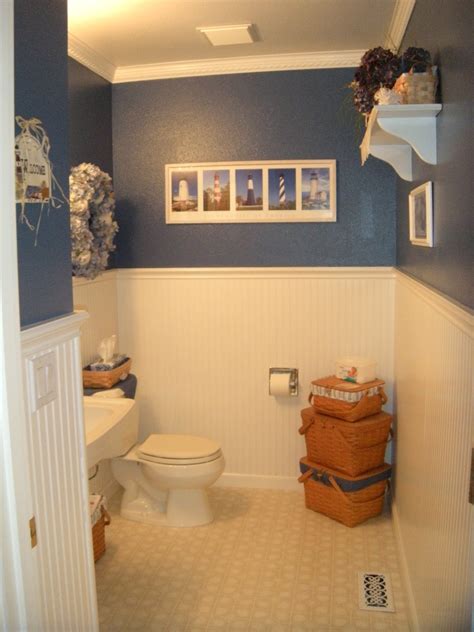 The beadboard covers the bathroom's wall that includes the towel keeper. The Plaid Basket: A Beadboard Bathroom