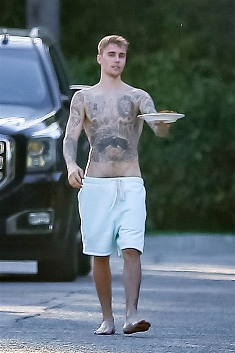 justin bieber goes shirtless and serves a sandwich in sexy new pics hollywoodlife heard zone