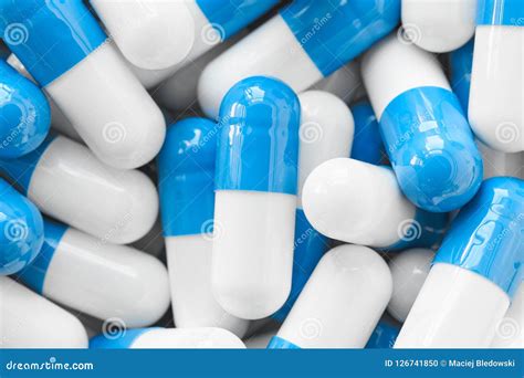 Close Up Picture Of Blue And White Capsules Stock Photo Image Of
