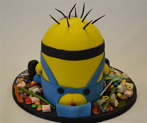 We have elvis minions, bride and groom minions and even a minion on a pogo stick. Small 3D Minion Cake Surrounded By Sweets - Celebration Cakes - Cakeology