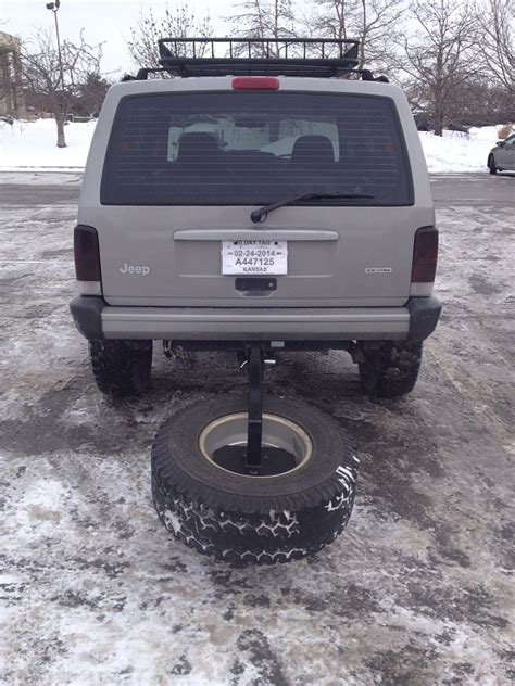 It has drawings of both, but no location of where the control module is located. spare tire carier - Jeep Cherokee Forum