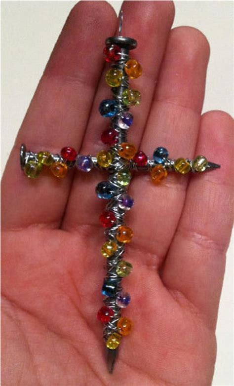 The great part about this craft is, you can bead your own cross out of pony beads, and i think it comes out absolutely adorable! Handmade Beaded Cross by nataliereyna on Etsy