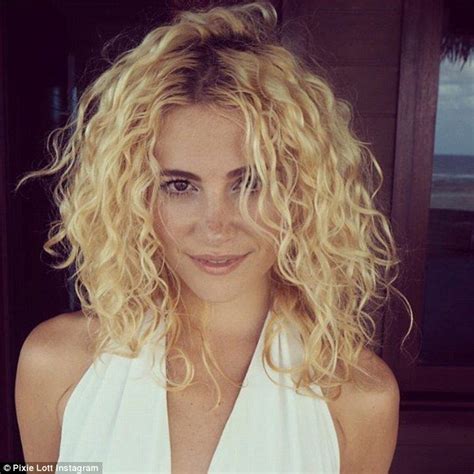 The cut will prevent the hair from looking like a curly mop. Her Marilyn moment: She also wore a stunning halter neck ...