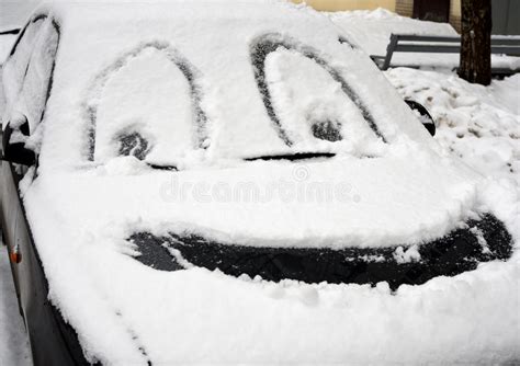 Drawing Smiley Face On The Snow Covered Car Stock Photo Image Of