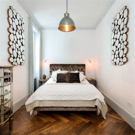 A sleeping area with a bed, a seating area with a chair, a little library or a home. Narrow or Small Rooms, Bedroom Design Ideas