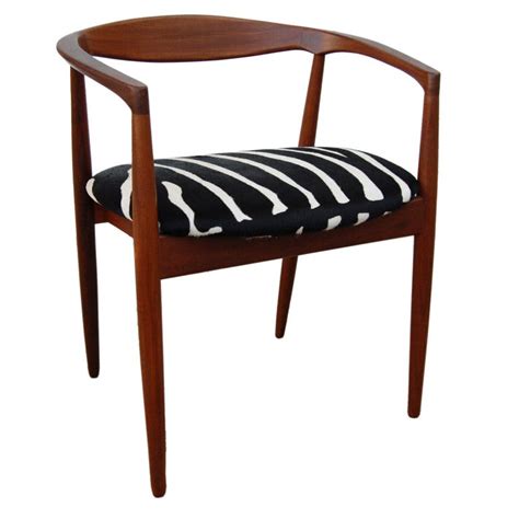 Rated 4.5 out of 5 stars. Danish Mid-Century Modern Teak Armchair For Sale at 1stdibs