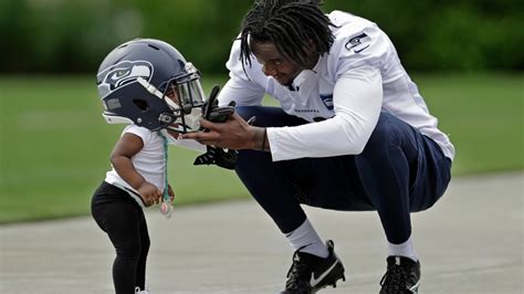 15 Adorable Photos Of Nfl Players With Their Kids At Training Camp