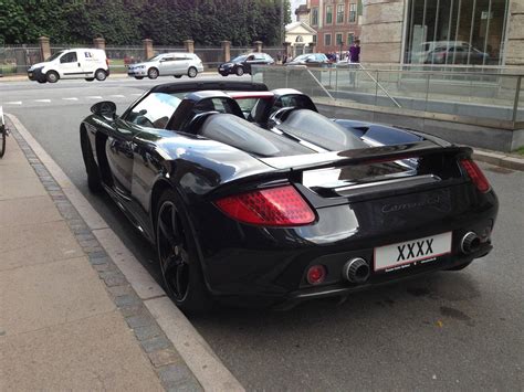 The carrera gt is one of our favorite cars of all time, even though it costs nearly $10,000 in maintenance for every. Spotted this black beauty outside my office. Blacked out ...