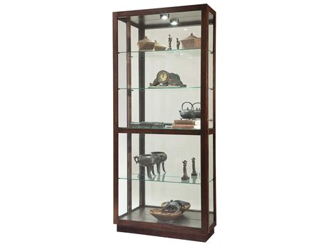 Finished in espresso on select hardwoods and veneers. Howard Miller Jayden Espresso Curio Cabinet | HOW680575