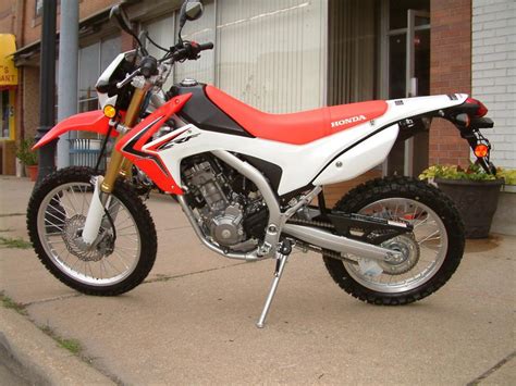 The honda and suzuki motorcycle brands have a lot in common. 2014 Honda CRF250L Dual Sport for sale on 2040motos