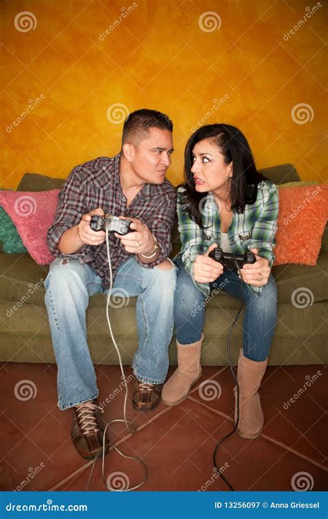 Hispanic Couple Playing Video Game Stock Image Image Of Adult Play 13256097