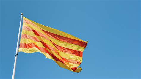La Senyera The Red And Yellow Flag Of Catalonia Flying In Girona