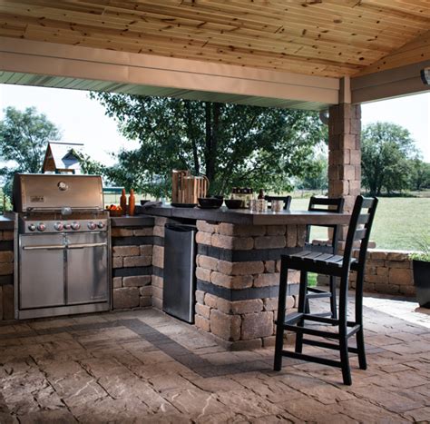 Outdoor kitchens have turned out to be more detailed, adding extra components such as gas lines, sinks, and even this beautiful outside kitchen feels like a comfortable and welcoming extension to a home. Outdoor Kitchens | Buresh Home Solutions