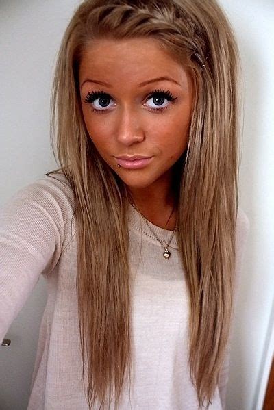 tan girl blonde hair she looks more like burnt but shows tan girls can pull it off too