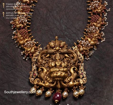 Antique Gold Peacock Nakshi Necklace With Lakshmi Pendant