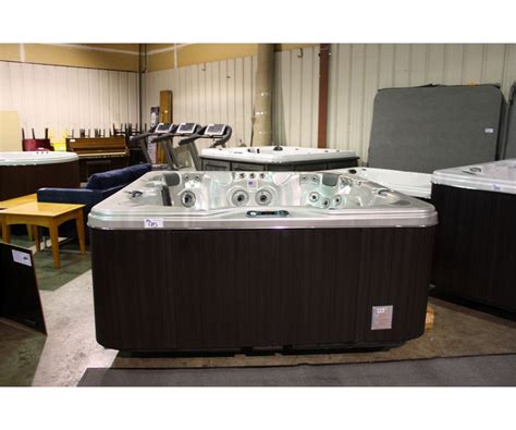 82 X 82 Cal Spas Coleman Series Hot Tub With Oyster Opal Interior And Grey Mist Cabinet