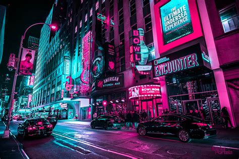 Nighttime Photos Capture Vibrant Pink Glow Of Times Squares Neon Lights
