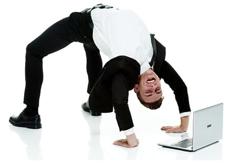 Businessman Bending Over Backwards Stock Photo Download Image Now