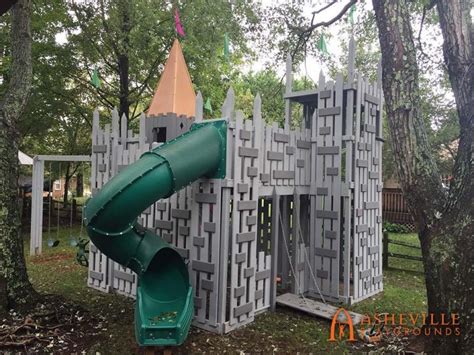 Castle Themed Playground With Swings Drawbridge And Spiral Slide