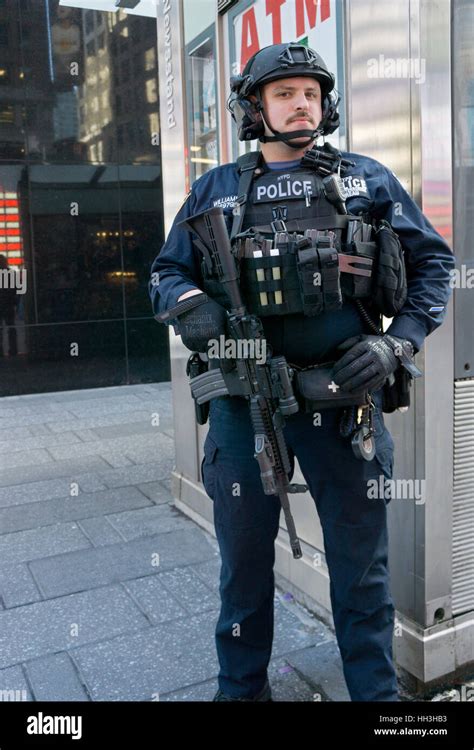 An Armed Nypd Counterterrorism Policeman On Patrol In Times Square In
