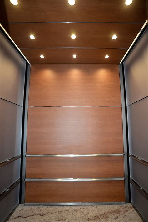 Evolving Interior Design For 3 Uniquely Sized Elevator Cabs At