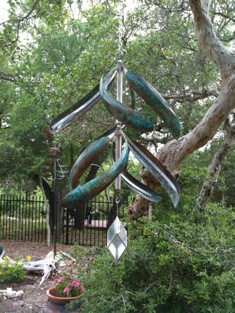 From small wind spinners to large wind powered robots they are often feats of engineering genius. Feather Copper Wind Sculpture | Wind sculptures, Kinetic ...