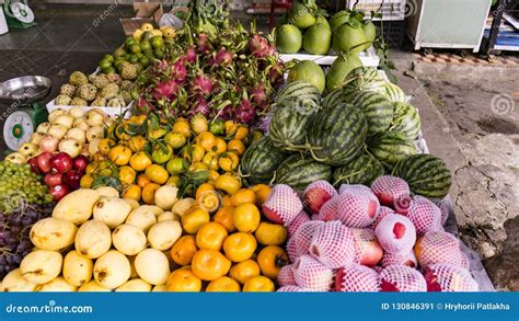 Many Exotic Fruits And Vegetables On A Market In The Streets Stock