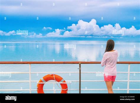 Cruise Ship Luxury Travel Woman On Deck Looking Away In Tahiti Serene Still Ocean Water