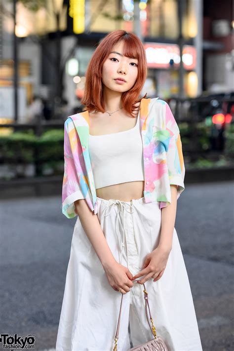 19 Year Old Japanese Model Uta On The Street In Harajuku With An Orange