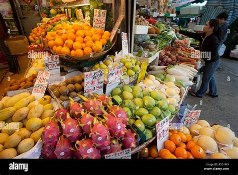 China Hong Kong Wan Chai Fruit Stall In Street Market Stock Photo