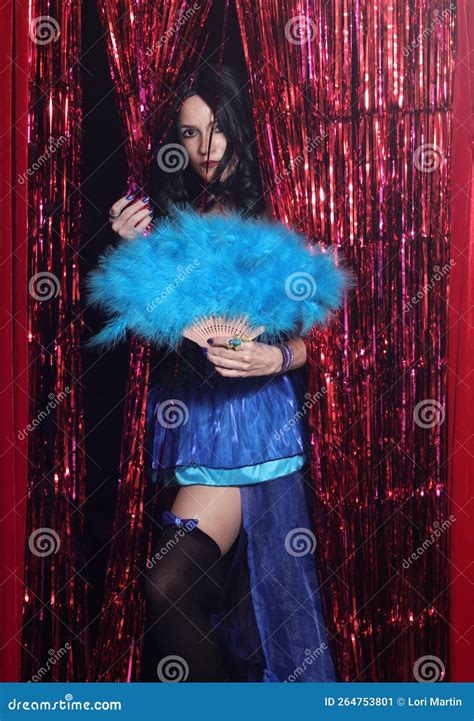 Woman Wearing Blue Corset Preforming Burlesque Dance With Feather Fan Stock Image Image Of
