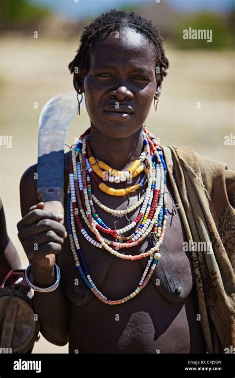 Traditional Arbore Tribal Woman Carrying A Big Knife Stock Photo Alamy