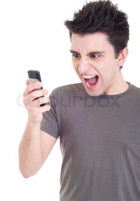 Man Yelling Into Mobile Stock Image Colourbox