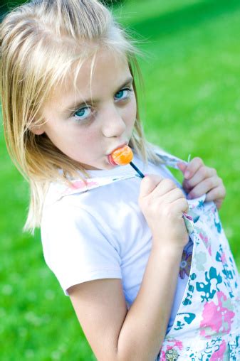 Cute Little Girl With Lollipop Stock Photo Download