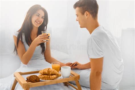 Couple Having Breakfast In Bed Stock Photo Image Of Adult Couple