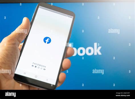 Phone Showing Facebook App On The Screen Facebook Is A Photo And Video