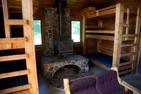 Installing a better wood stove in our cabin. Lakeside Cabin Bunks and Wood Stove for Heat - The ...