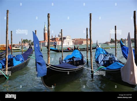 View Of Gondolas In Front Of San Giorgio Maggiore Island Stock Photo