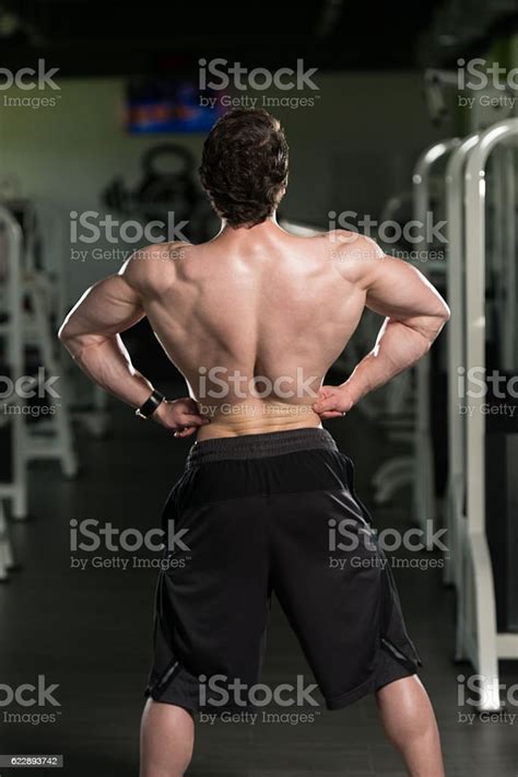Bodybuilder Performing Front Lat Spread Pose Stock Photo Download