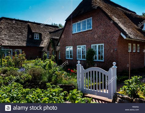 Thatched Cottage In Northern Germany Stock Photo Alamy