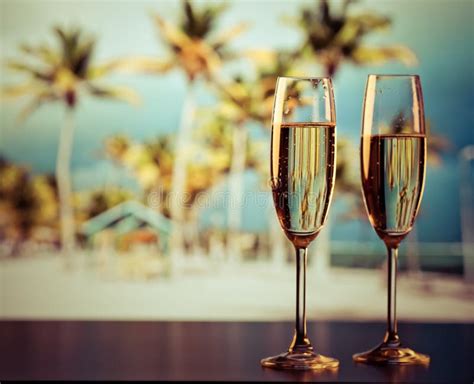 two champagne glasses on the beach exotic new year stock image image of relaxation relax
