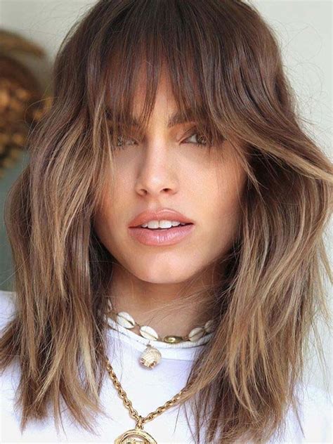 Hairstyles 2020 female medium length with bangs. Best Medium Haircuts with Bangs to Show Off in 2020